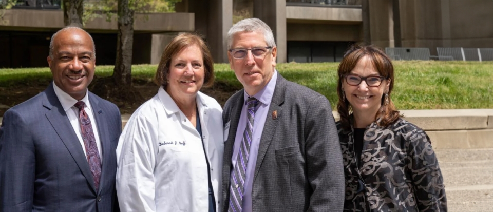 Chancellor Gary May, Deborah Neff ’76, College of Biological Sciences Dean Mark Winey and Kimberly McAllister